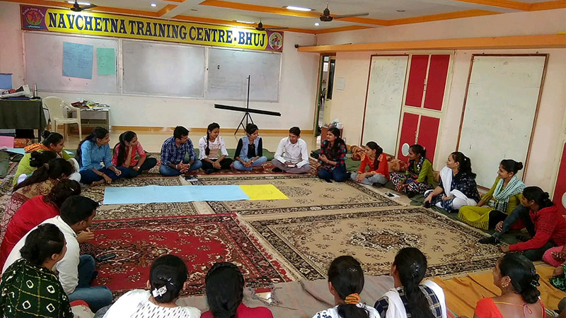 The CSPC team discusses topics related to menstruation, hygiene, and women’s health, with members of the community at a meeting in Bhuj, Kutch