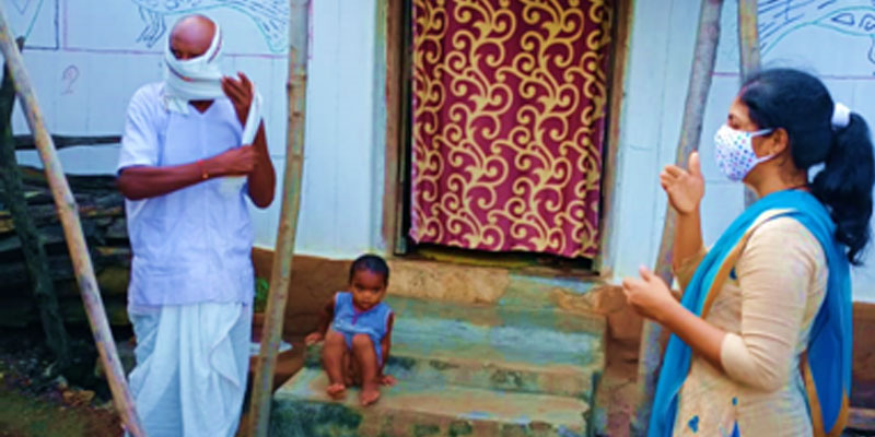 Volunteer explaining Covid-19 precautionary measures to an elder in Shegav, Chandrapur Volunteer explaining Covid-19 precautionary measures to an elder in Shegav, Chandrapur