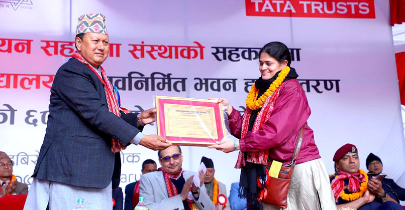 Amrita Patwardhan, Zonal Head, North, Tata Trusts, receiving an appreciation letter from Mohan Bahadur Basnet, former Minister for Information and Communications, Government of Nepal