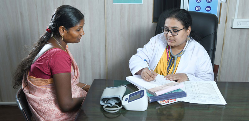 A doctor with her patient during a consultation hour