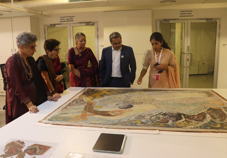 Nayanamrutha, conservation-intern, explaining the conservation processes to guests