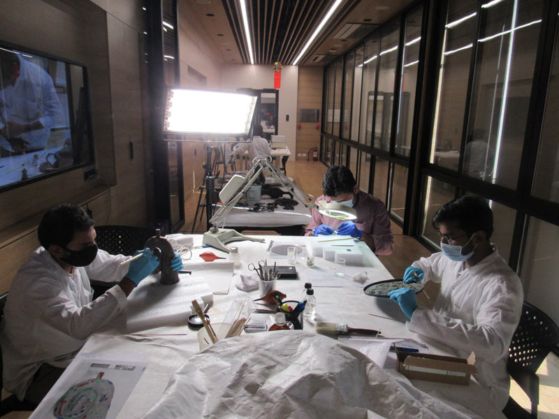 Participants conserving metal objects during the course