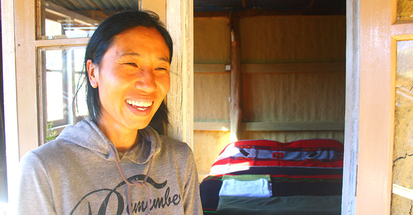Ms Kevisono, a homestay owner who rents out one of her rooms to tourists