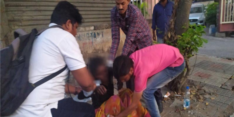 The field response team helping a starving elder to move her to an old age home. The field response team helping a starving elder to move her to an old age home.