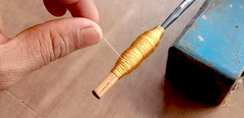 Winding thread by hand