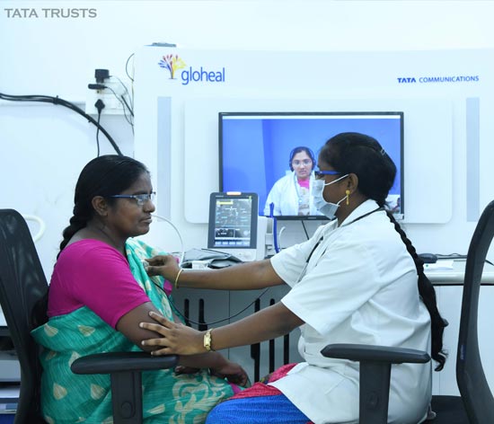 A health check-up being conducted at a telemedicine centre A health check-up being conducted at a telemedicine centre