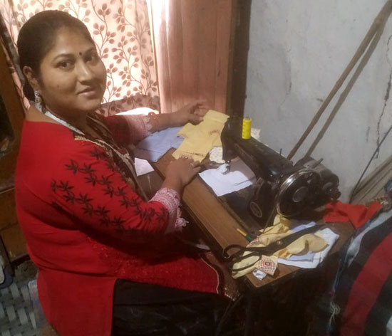 Kiran sewing a cloth pad