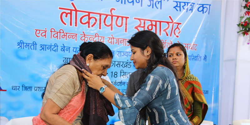 A Tata Trusts representative welcoming the chief guest