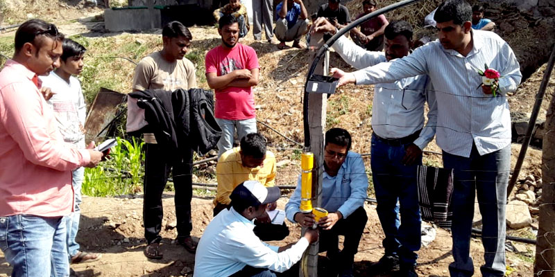 The technical team installing the biodigester
