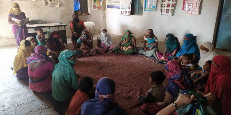 Ms. Sunita Parmar conducting an SMC meeting at Khuntamodi village