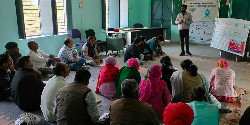 Villagers attending a VWSC training session in Balda-R