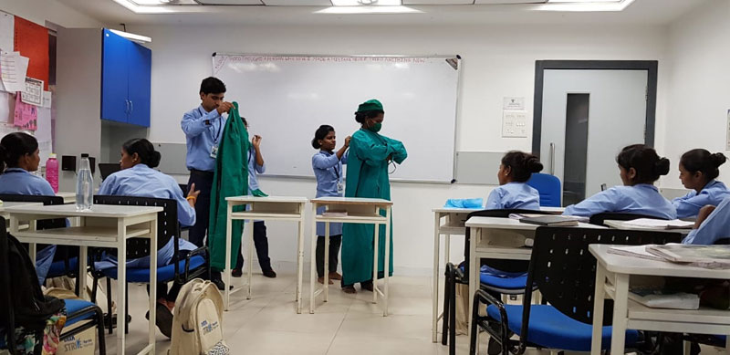 Students learning the skills of a General Duty Assistant at Tata STRIVE Skill Development Centre