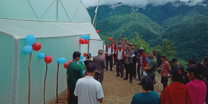 Assistant Horticulture Officer (AHO) Tuensang, Shri. Yonkonglimba launching the polyhouse unit at Chendang village, Tuensang