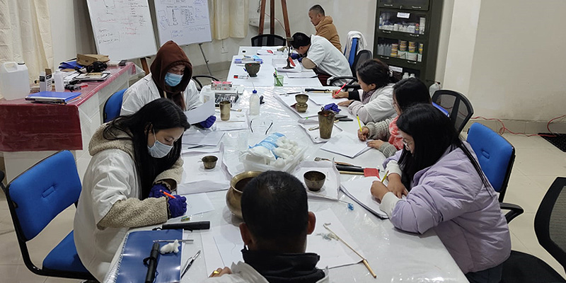 Participants at work in the conservation lab.