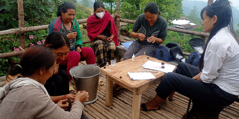 Training WQT members in field testing kits