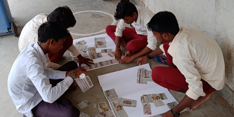 Older students read news articles related to migrant workers’ struggles during the pandemic and created collages of the clippings