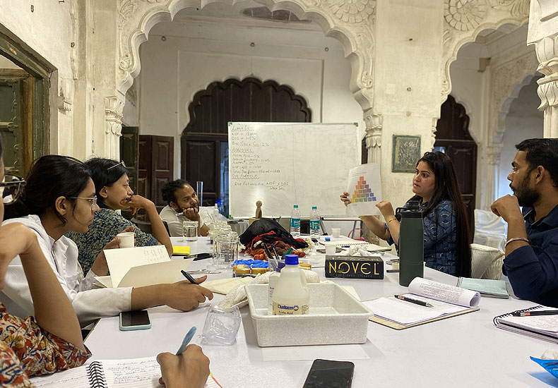 Course Leader Deepshikha Kalsi explaining the synthetic dyes used in textiles conservation