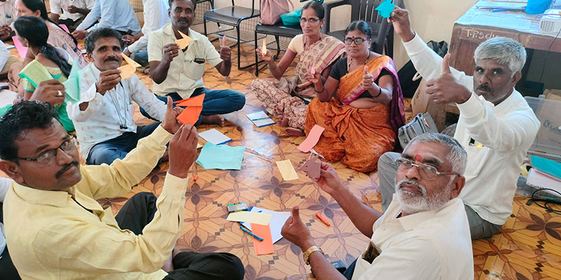 Librarians in Shahapur take part in a group storytelling activity as part of their training programme