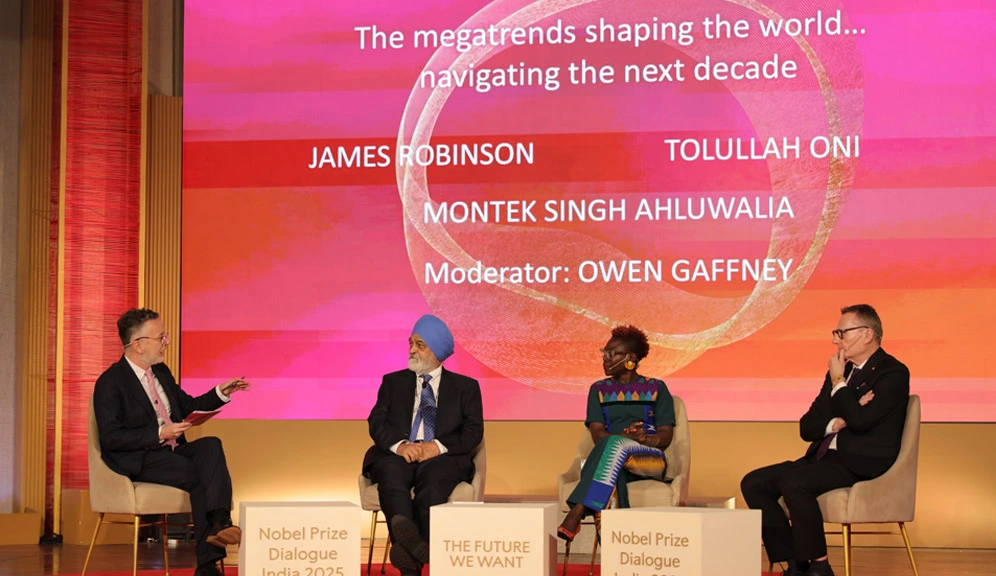 Leaders from science, academia and policy come together for a discussion on “The Megatrends Shaping the World, Navigating the Next Decade”. Moderated by Owen Gaffney, chief impact officer, Nobel Prize Outreach, the panel featured (from left) Montek Singh Ahluwalia, economist and former deputy chairman, Planning Commission of India; Tolullah Oni, scientist and epidemiologist; and James Robinson, Nobel Laureate in economic sciences, 2024.