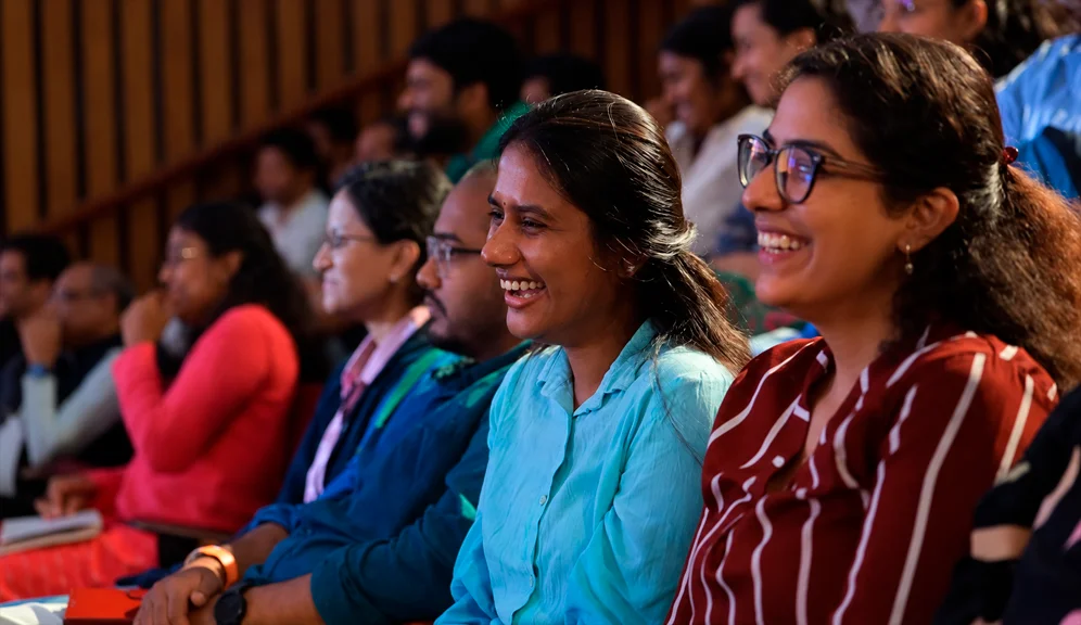 A glimpse of cheerful faces in the audience, capturing the energy and enthusiasm that filled the auditorium at the Nobel Prize Dialogue India 2025.