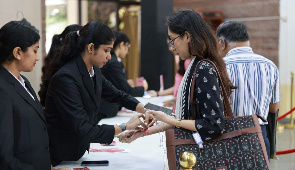 Audience at the registration desk before the Nobel Prize Dialogue 2025.