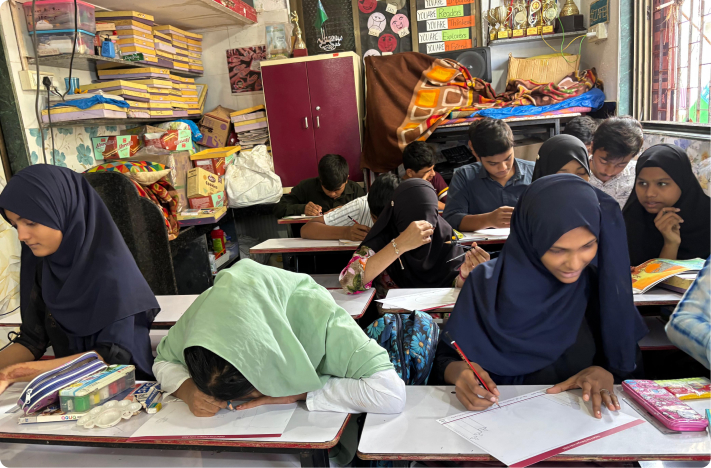 A group of children sat together sketching the futures they dream of - filled with dignity, opportunity and equality. The session created space for them to imagine and express who they want to become and the India they hope to see.