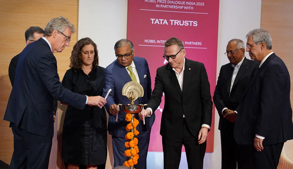 From left: Nobel Laureate David MacMillan (chemistry 2021); Siddharth Sharma, CEO, Tata Trusts; Hanna Stjärne, Executive Director, Nobel Foundation; Natarajan Chandrasekaran, Chairman, Tata Sons; Nobel Laureate James Robinson (economic sciences 2024); Venu Srinivasan, Vice-Chairman, Tata Trusts and Chairman Emeritus, TVS Motor Company; and Noel Tata, Chairman, Tata Trusts, inaugurate the Mumbai edition of the Nobel Prize Dialogue India 2025 by lighting the ceremonial lamp.