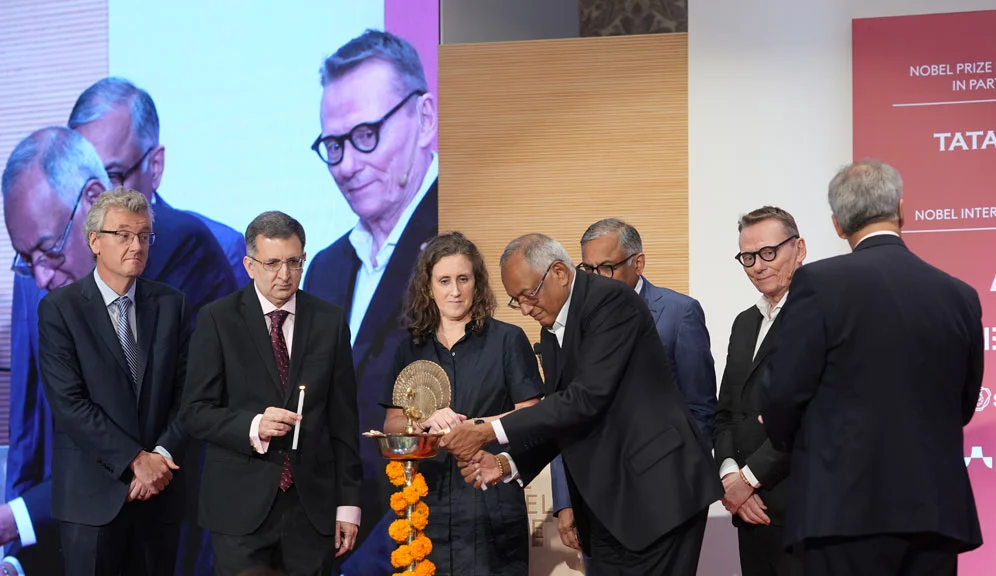 From left: Nobel Laureate David MacMillan (chemistry 2021); Siddharth Sharma, CEO, Tata Trusts; Hanna Stjärne, Executive Director, Nobel Foundation; Venu Srinivasan, Vice-Chairman, Tata Trusts and Chairman Emeritus, TVS Motor Company; Natarajan Chandrasekaran, Chairman, Tata Sons; Nobel Laureate James Robinson (economic sciences 2024); and Noel Tata, Chairman, Tata Trusts, inaugurate the Mumbai edition of the Nobel Prize Dialogue India 2025 by lighting the ceremonial lamp.