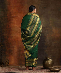 Bottle green pure silk Venkatagiri sari with checks and Pettu border