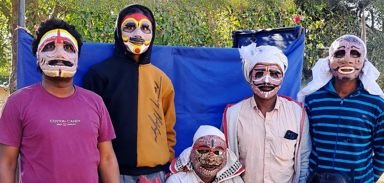 Masked artists, trained by CmF, deliver the WaSH campaign's key messages through their performance at a habitation in south Rajasthan