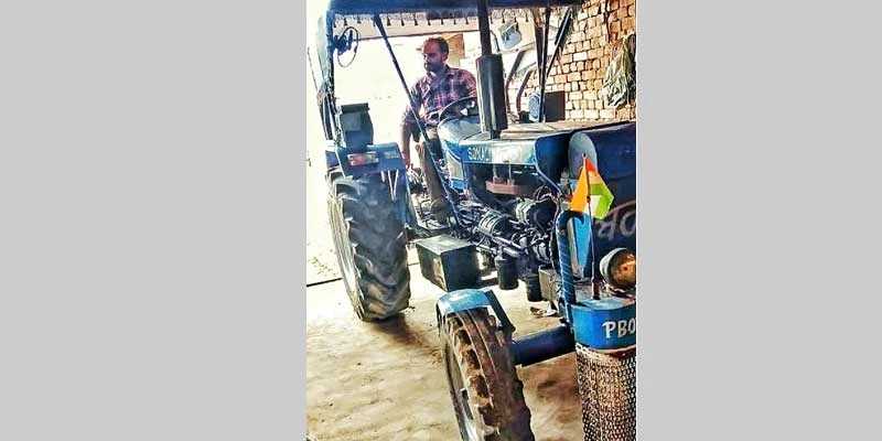 Hardeep Singh Brar on his tractor.