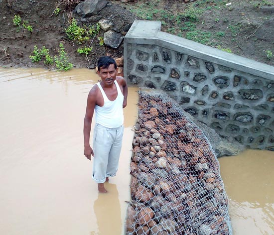 Rainwater accumulated in Ramesh Damaji Gedam's check dam in Warud village in Yavatmal will now provi