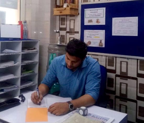 Ravi, hard at work, at his office