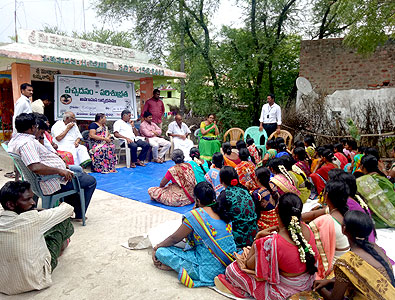 The womenfolk of the village being counseled on the importance of building a toilet in each house